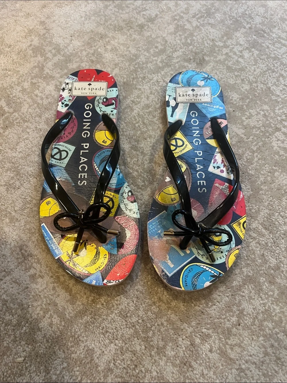 Women’s kate spade Multicolor Travel Print Flip Flops with Black Glossy Straps